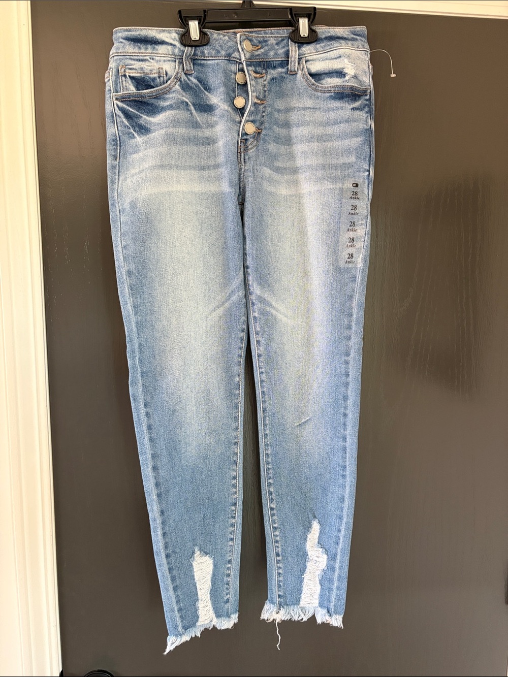Light Blue High-Rise Distressed Ankle Jeans with Button-Fly